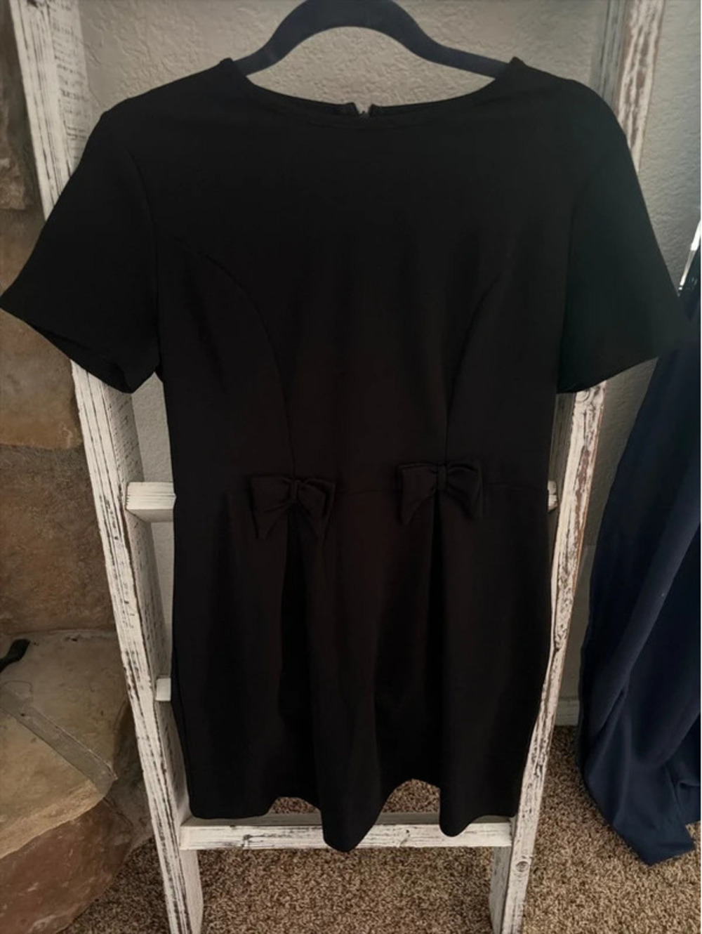 Black dress with bow accents